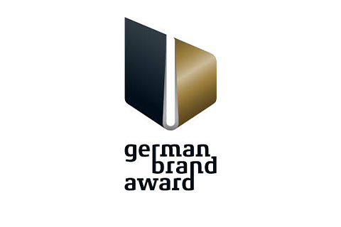 German Brand Award-Logo mit schwarz-goldenen geometrischen Formen über dem fettgedruckten Award-Namen.