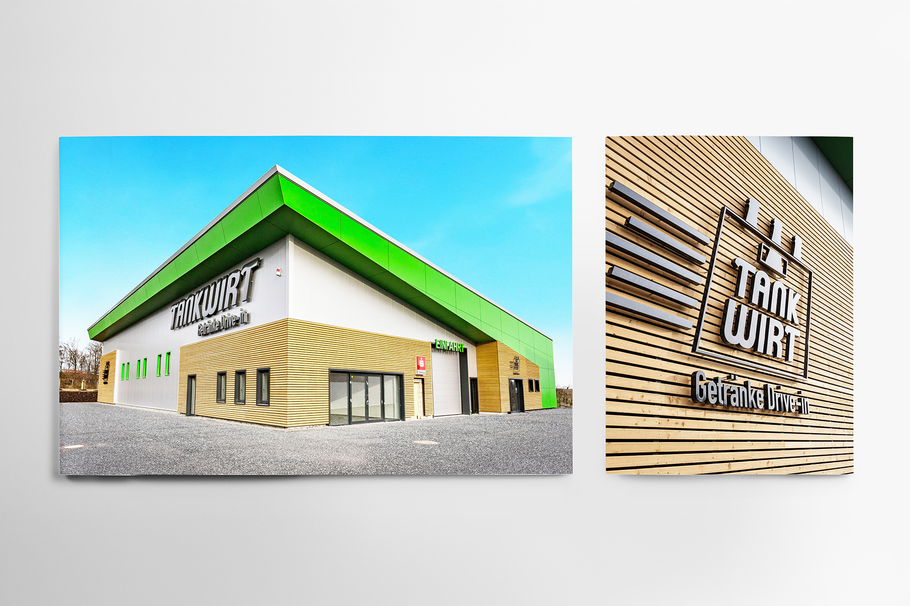 Modernes Geschäftshaus mit Dachbegrünung und Beschilderung Tankwirt Getränke Unverpackt.